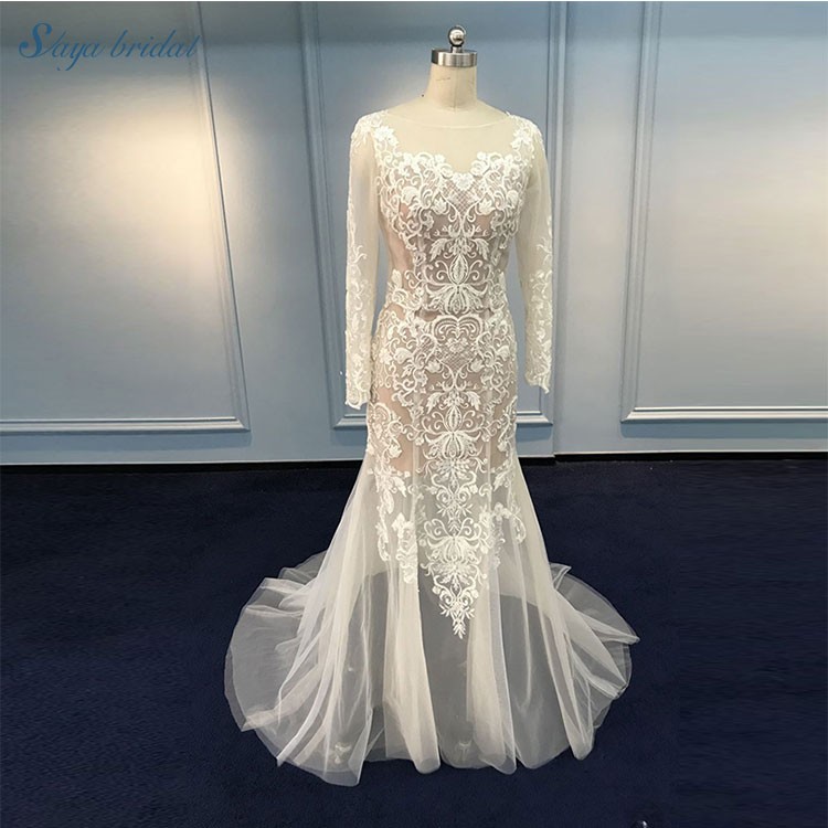 Long sleeve ivory mermaid wedding dress with detachable train