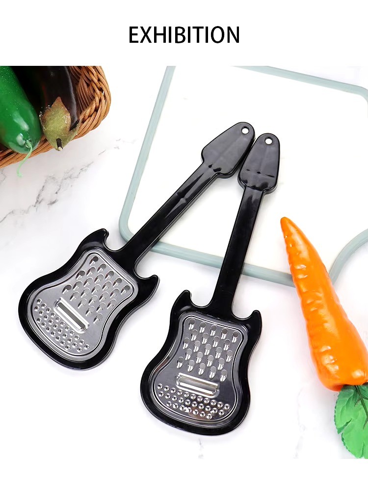 Cheap stainless steel multi-functional guitar shape vegetable and fruit grater household melon planer with plastic handel